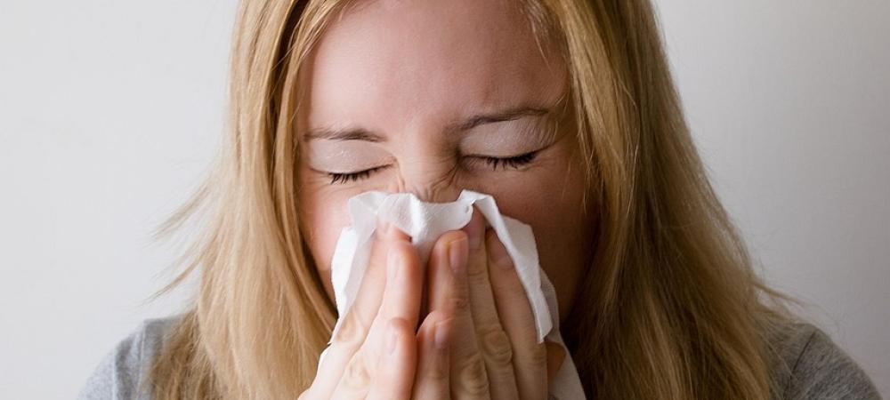 Woman Sneezing